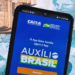 Auxílio Brasil: Indenização de R$ 15 mil LIBERADA faz a alegria de brasileiros