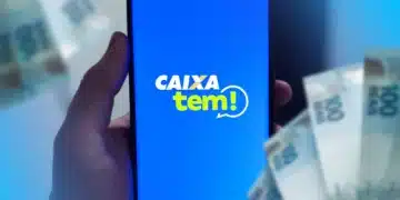 Tela do aplicativo Caixa Tem exibindo a opção para entrar, com dinheiro ao fundo.