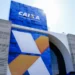 Fachada de um prédio da Caixa Econômica Federal com logo em destaque.