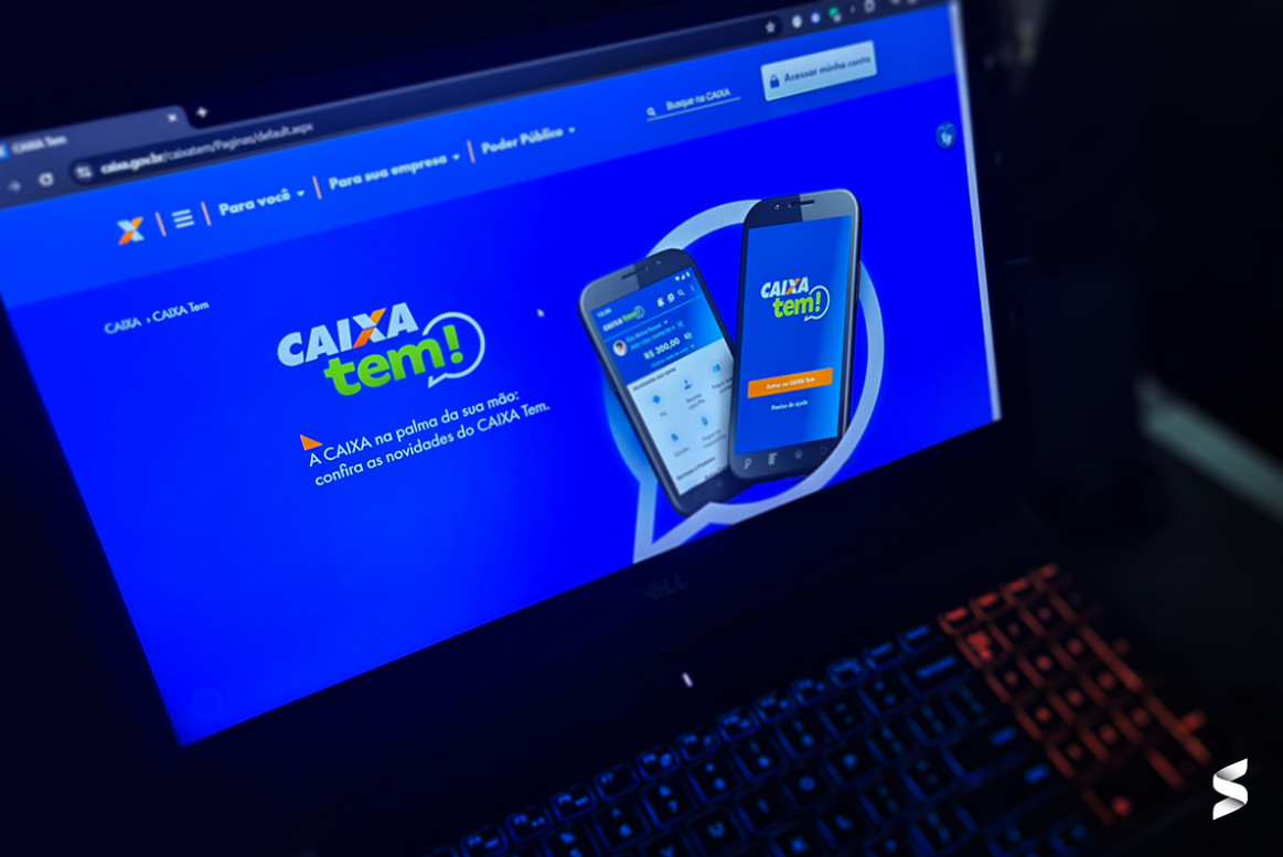 Tela de um laptop exibindo o site do Caixa Tem, destacando o aplicativo e suas funcionalidades.