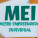 Dinheiro e conceito de MEI - Microempreendedor Individual em destaque