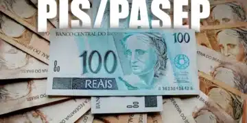 "Nota de R$ 100 com outras cédulas de reais ao fundo, representando o abono salarial do PIS/PASEP."
