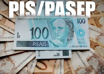 Notas de 100 reais e fundo PIS/Pasep ilustrando o pagamento do benefício no Brasil.