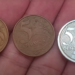 "As 3 moedas mais valiosas do real: 5 centavos de 2006, 5 centavos de 2005 e 50 centavos de 2012 (moeda híbrida).