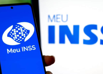Logo do Meu INSS exibido em um celular, representando os serviços de consulta e agendamento de benefícios do INSS em 2025.