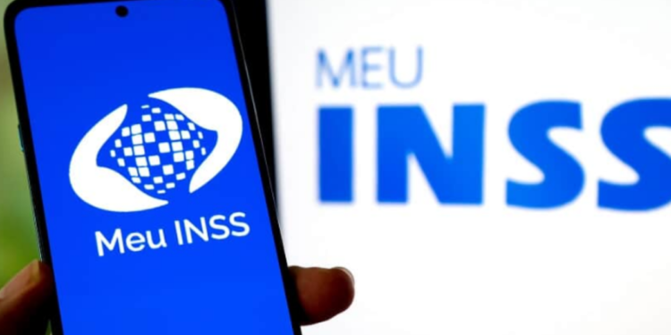Logo do Meu INSS exibido em um celular, representando os serviços de consulta e agendamento de benefícios do INSS em 2025.