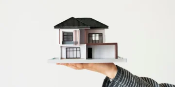 Modelo de casa moderna representando financiamento imobiliário com FGTS Futuro.