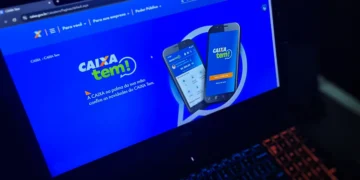 Tela do site oficial do CAIXA Tem, mostrando smartphones com a interface do aplicativo.