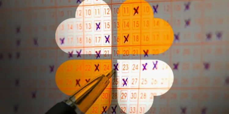 Bilhete da Quina com números marcados e caneta, simbolizando a aposta no sorteio da Quina de São João.