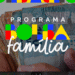 Mãos segurando reais brasileiros com texto sobreposto 'Programa Bolsa Família', destacando novas regras que afetam a elegibilidade.