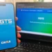 Tela inicial do aplicativo FGTS da Caixa no celular mostrando o logo e acesso ao serviço.
