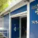 Entrada de unidade de saúde com logotipo do SUS, representando novo acesso pelo plano de saúde