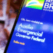 Tela de celular com o aplicativo do Auxílio Emergencial do Governo Federal aberto.