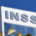 Fachada de um prédio com a sigla INSS em destaque.