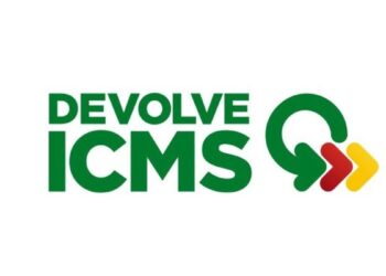 Logotipo do programa Devolve ICMS com setas nas cores verde, vermelho e amarelo.