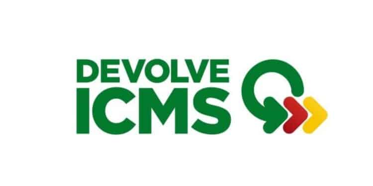 Logotipo do programa Devolve ICMS com setas nas cores verde, vermelho e amarelo.