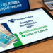 Tablet exibindo tela da Receita Federal com restituição de R$ 1.200 liberada, notas de real e calculadora