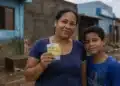 Família beneficiária do Bolsa Família em área afetada por desastre representa a proteção contra a suspensão do pagamento.